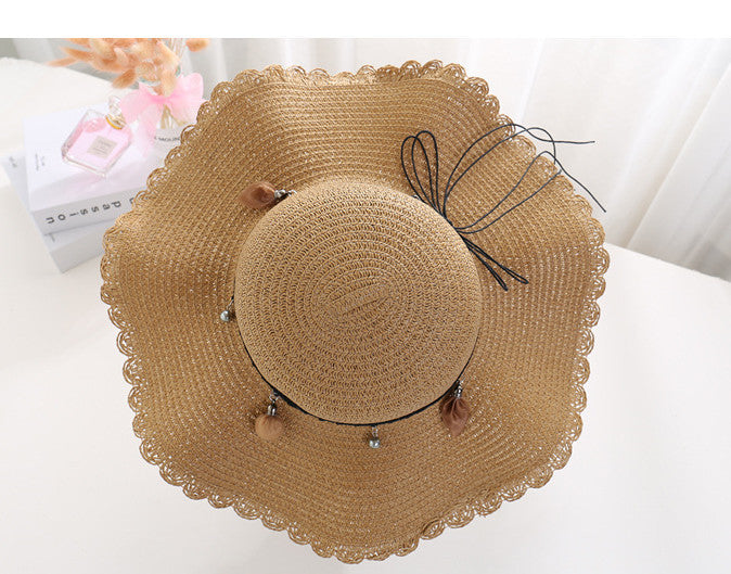 A Sunscreen Big Beach Wavy Hat